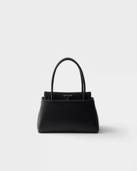 Prada Passage small leather bag with Re-Nylon flap