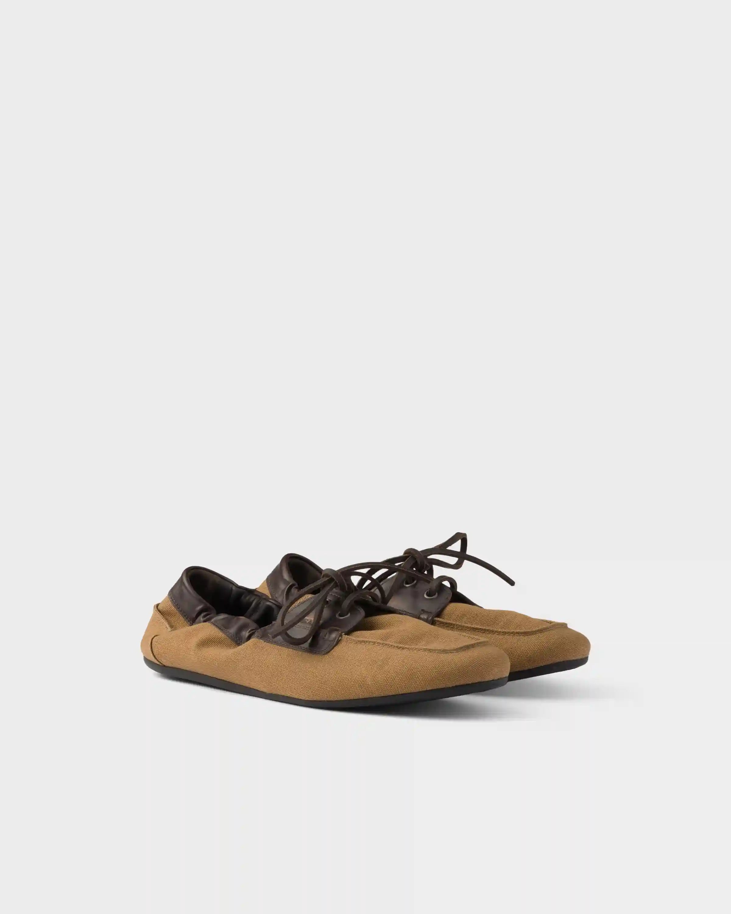 Shuffle aged canvas and leather boat shoes