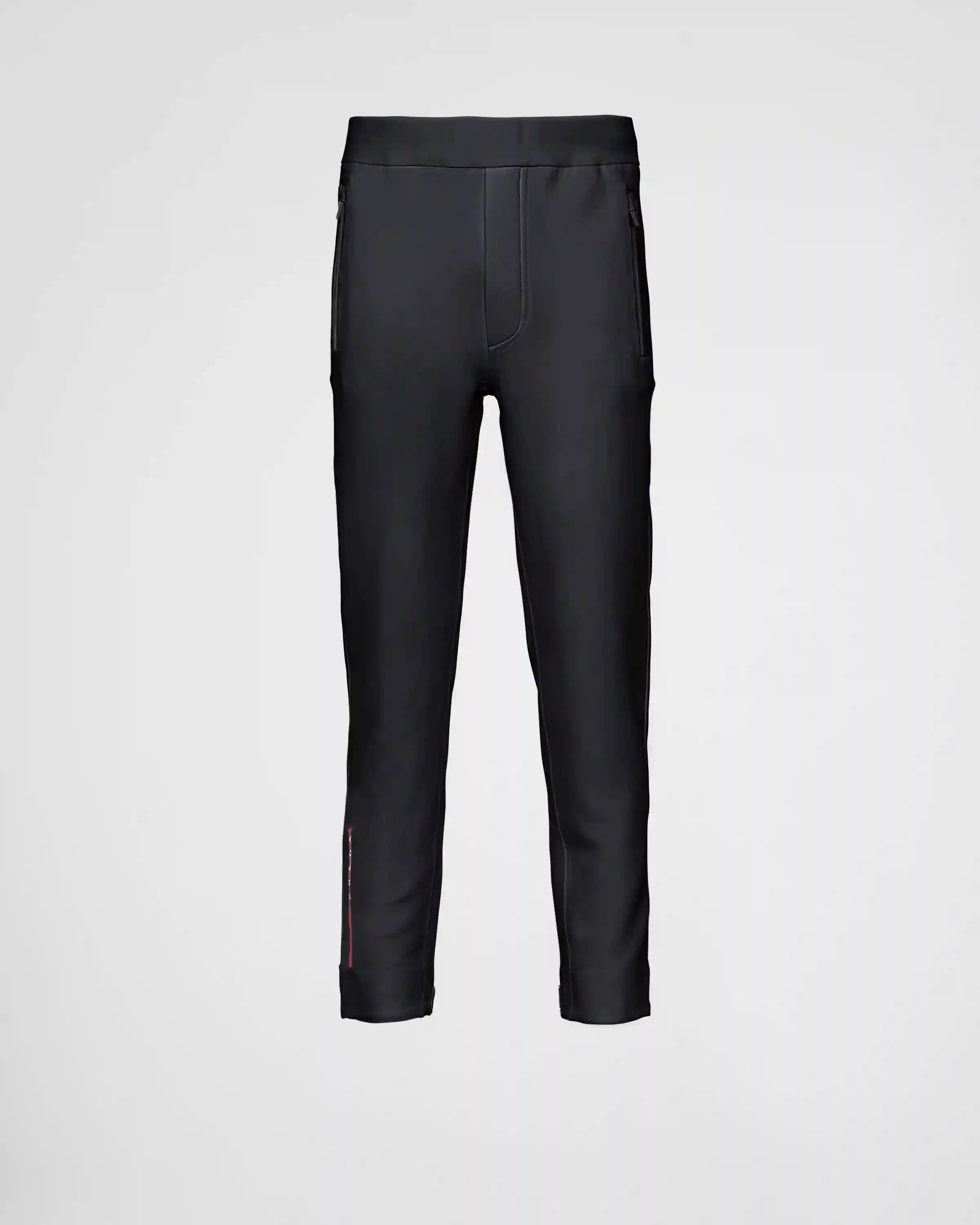 Technical fabric joggers with heat-sealed taped seams