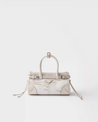 Prada Bonnie small printed linen and leather handbag