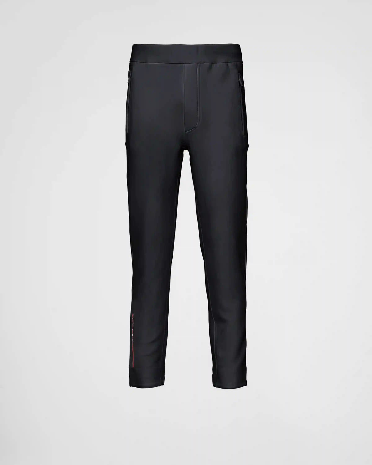 Technical fabric joggers with heat-sealed taped seams